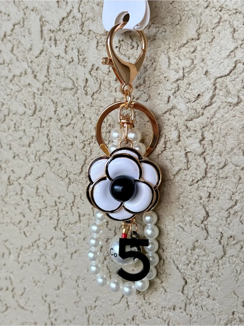 Luxe Gold & White Flower Keychain Charm with Black Accents